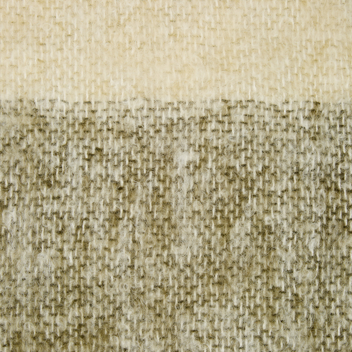 A close-up of woven fabric texture in two horizontal color bands: a light cream top section and a heathered taupe-beige bottom section.